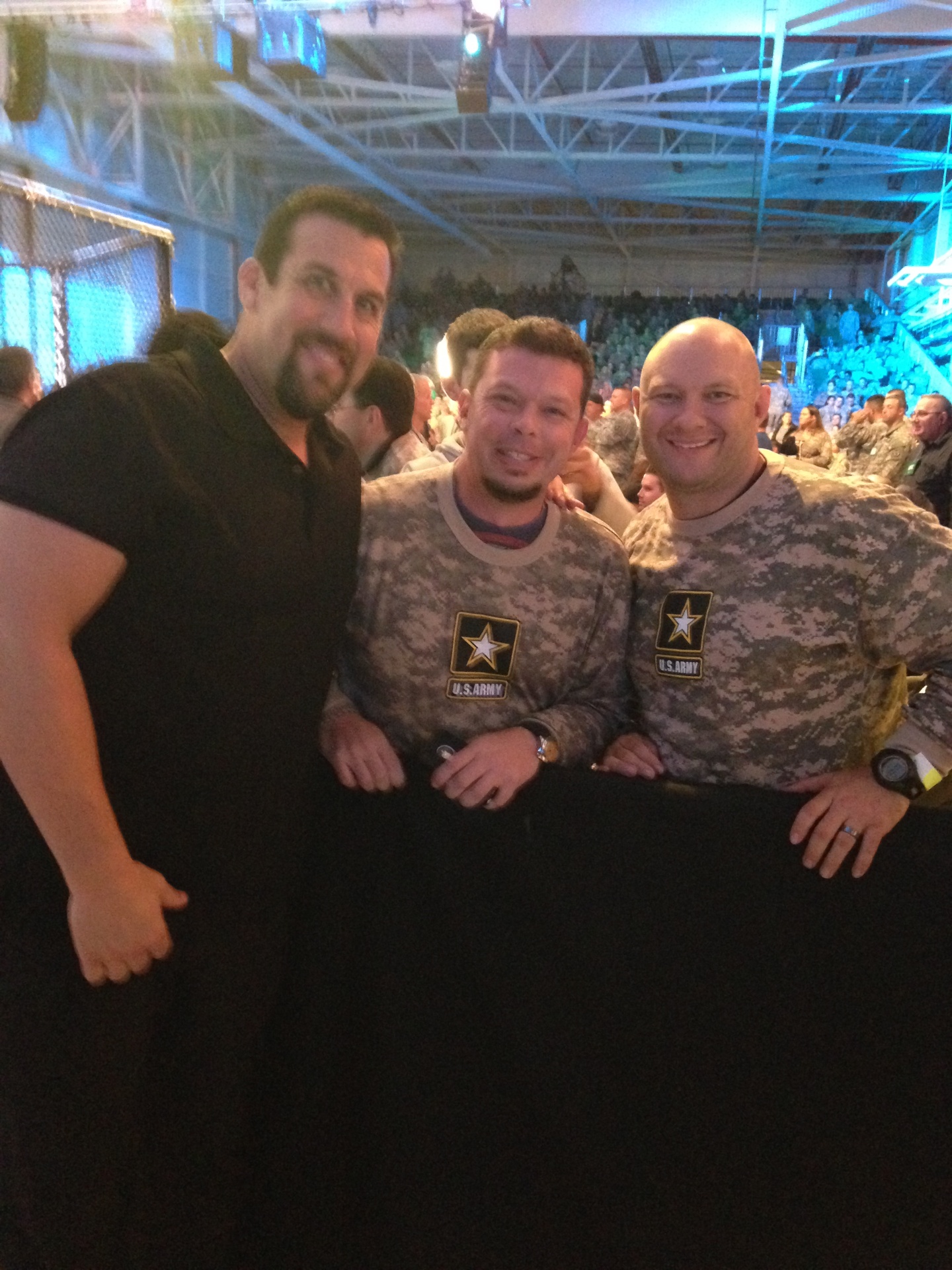 John Renken with US Army troops at a fight night event